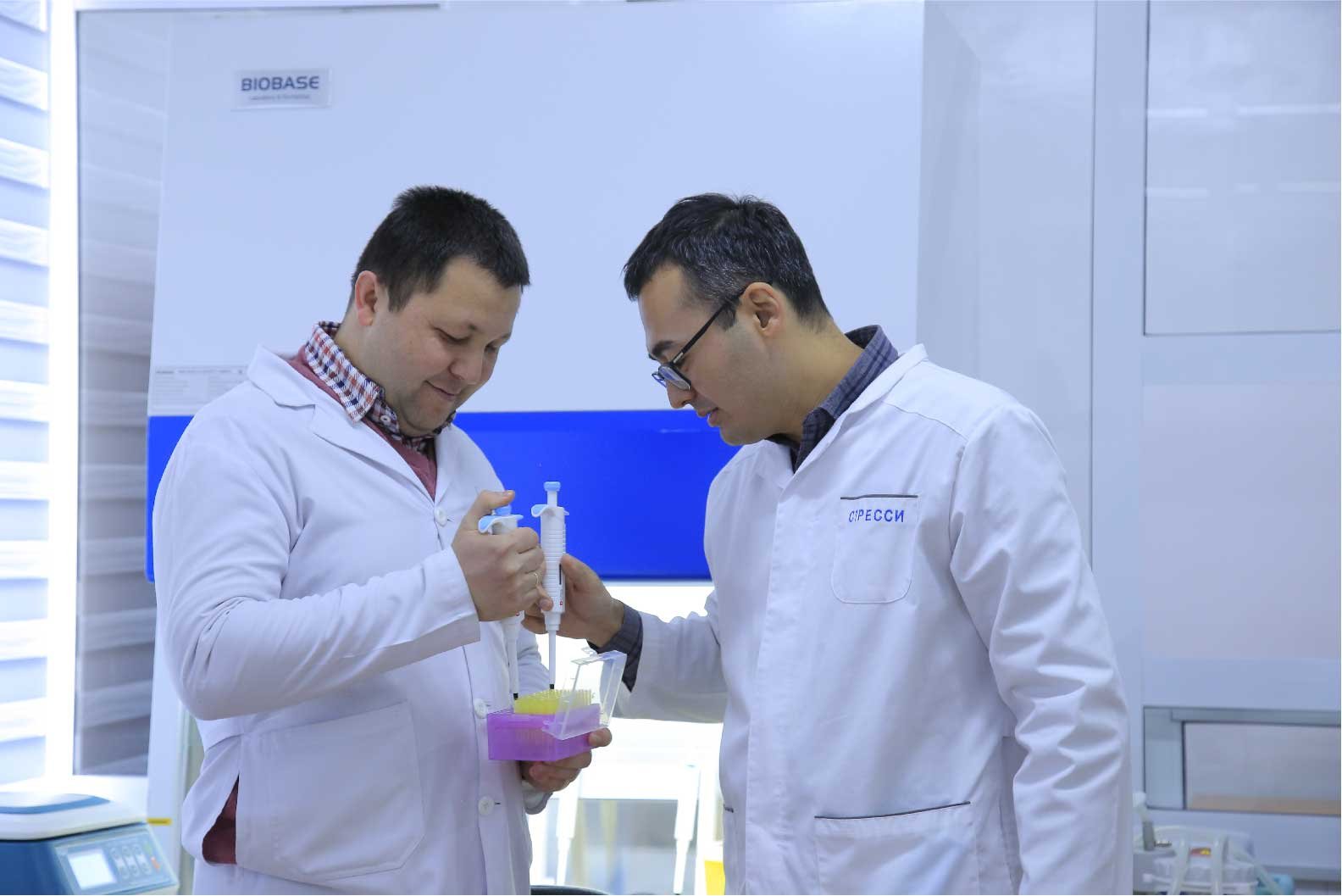 Faculty members carrying out a practical laboratory session